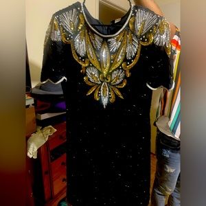 Hey I have a vintage sequin dress for sale! This is a size XL